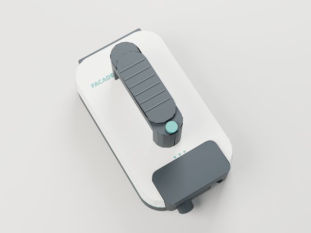 The scanner from above: the grip, thumb scan button and status lights.