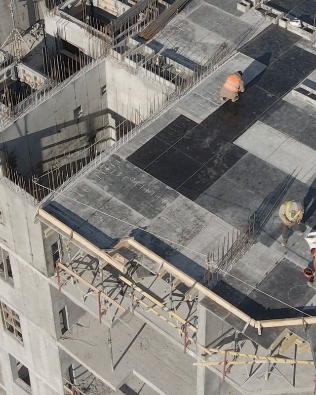 The slab edge and the floors below, with scaffolding along the facade.